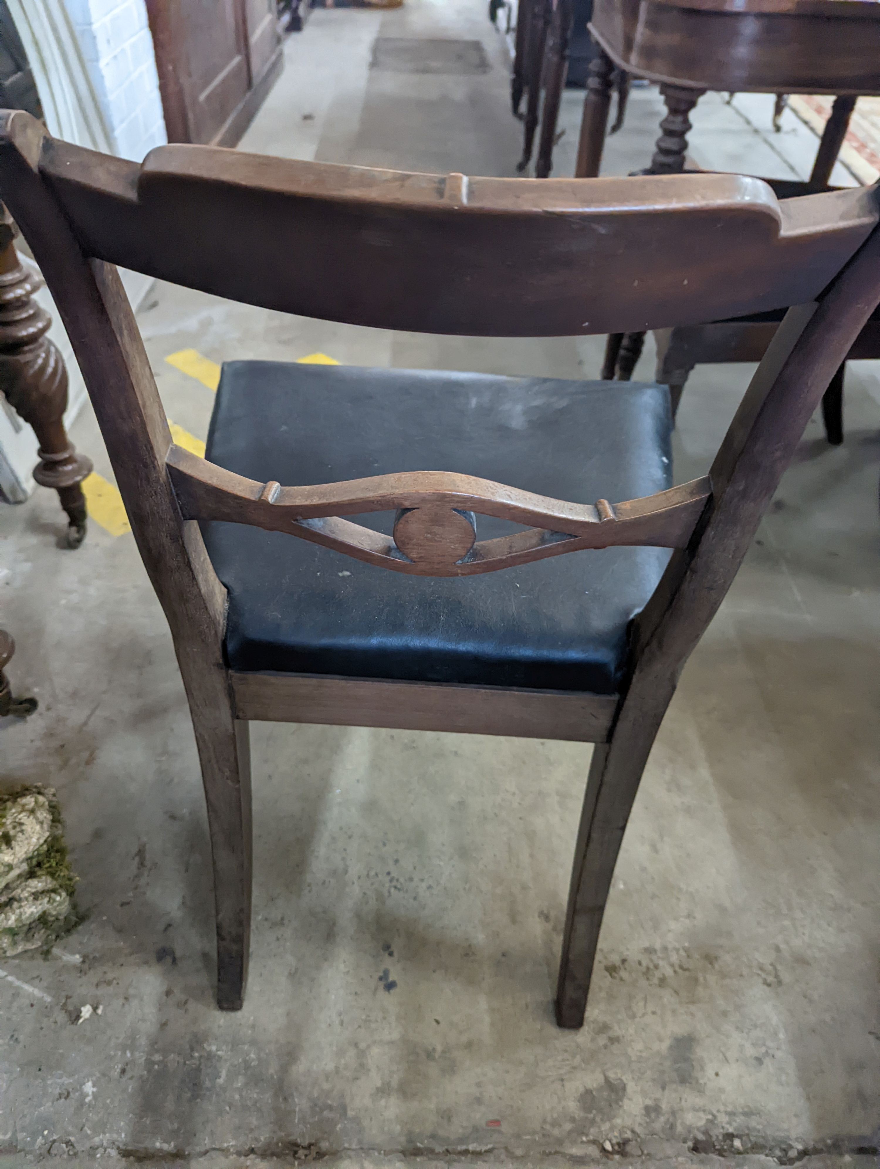 A pair of Regency mahogany dining chairs